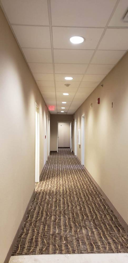 Commercial hallway with new patterned carpet